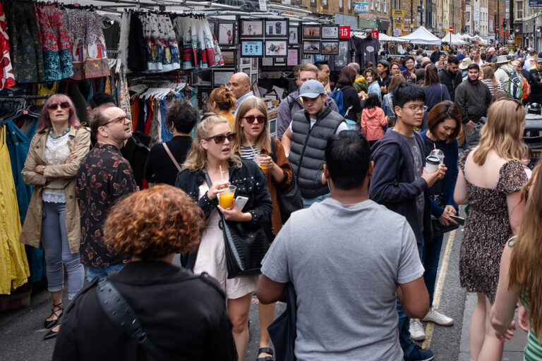 Crowd of peope at a local market in London